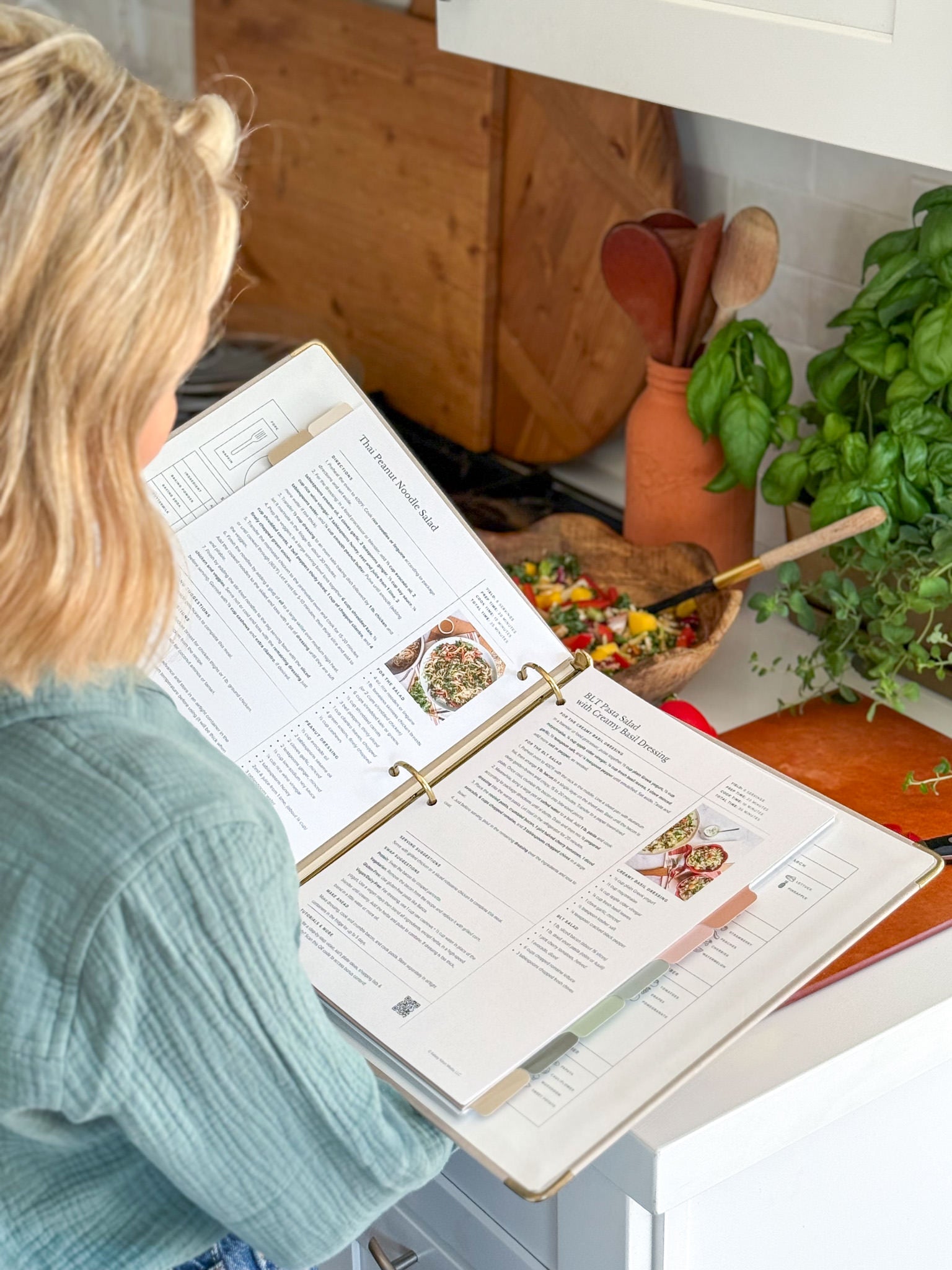 Printed salad recipes in Recipe Binder being used in Kitchen 