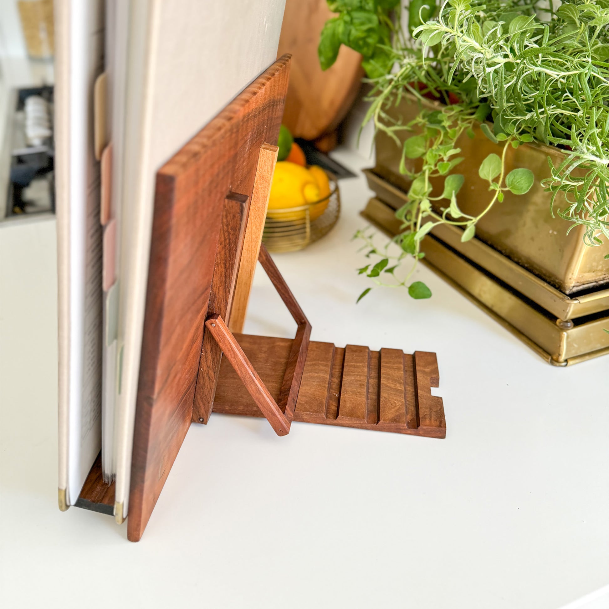 Adjustable back on Recipe Binder stand to lower or raise binder lays flat for storage